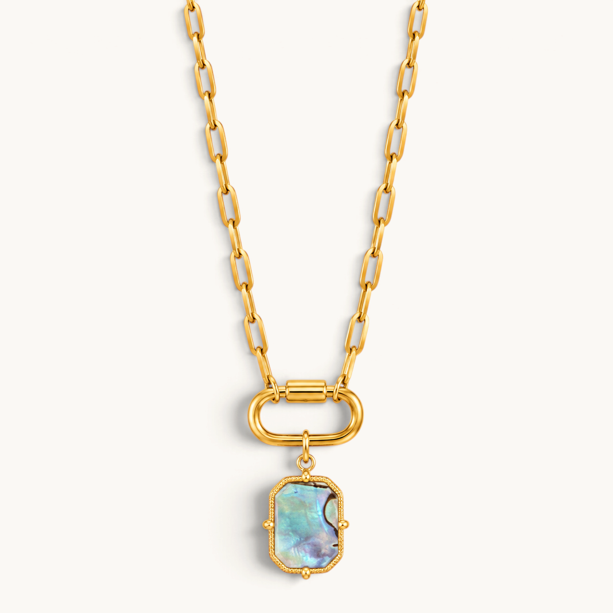 Nadare Co. Abalone Octagon Charm necklace featuring an iridescent shell inlay on a 14k gold-plated stainless chain.