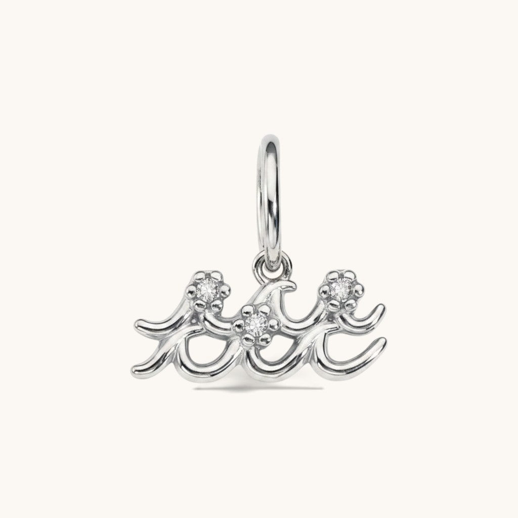 Nadare Co. silver Aquarius zodiac charm with cubic zirconia accents for necklace layering