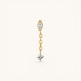 Nadare Co. Aria threadless earring front featuring a marquise-cut and round cubic zirconia connected by a gold chain.