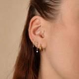 Nadare Co. Aria Threadless Front earring featuring marquise and round cubic zirconia stones on a delicate gold chain.