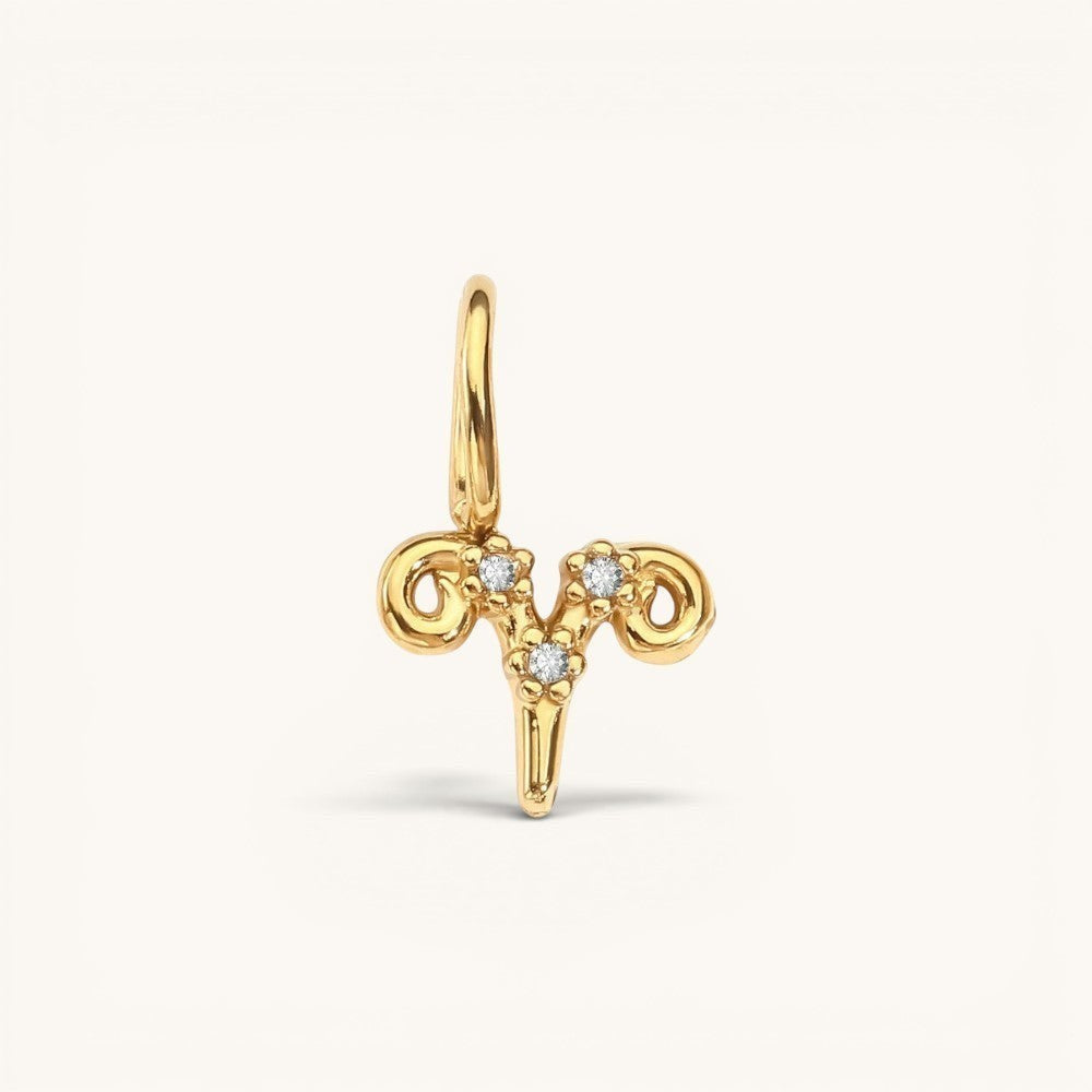 Nadare Co. gold-plated Aries zodiac charm with sparkling cubic zirconia accents for necklace layering.