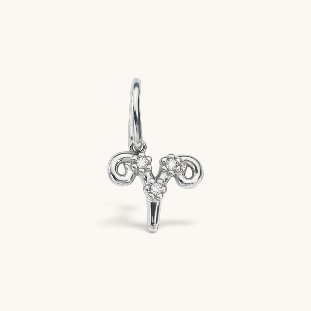 Nadare Co. silver Aries zodiac charm featuring sparkling cubic zirconia stones for necklace layering