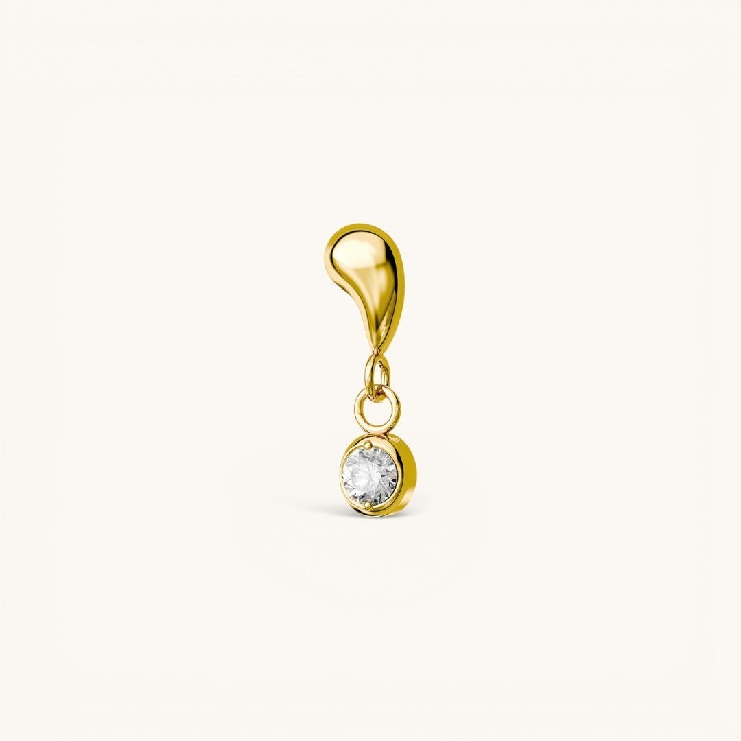 Nadare Co. Aura threadless gold earring front with a sculptural organic shape and a bezel-set cubic zirconia drop.