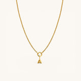 Nadare Co. gold bubble initial charm necklace featuring a playful, rounded letter A pendant on a delicate chain.