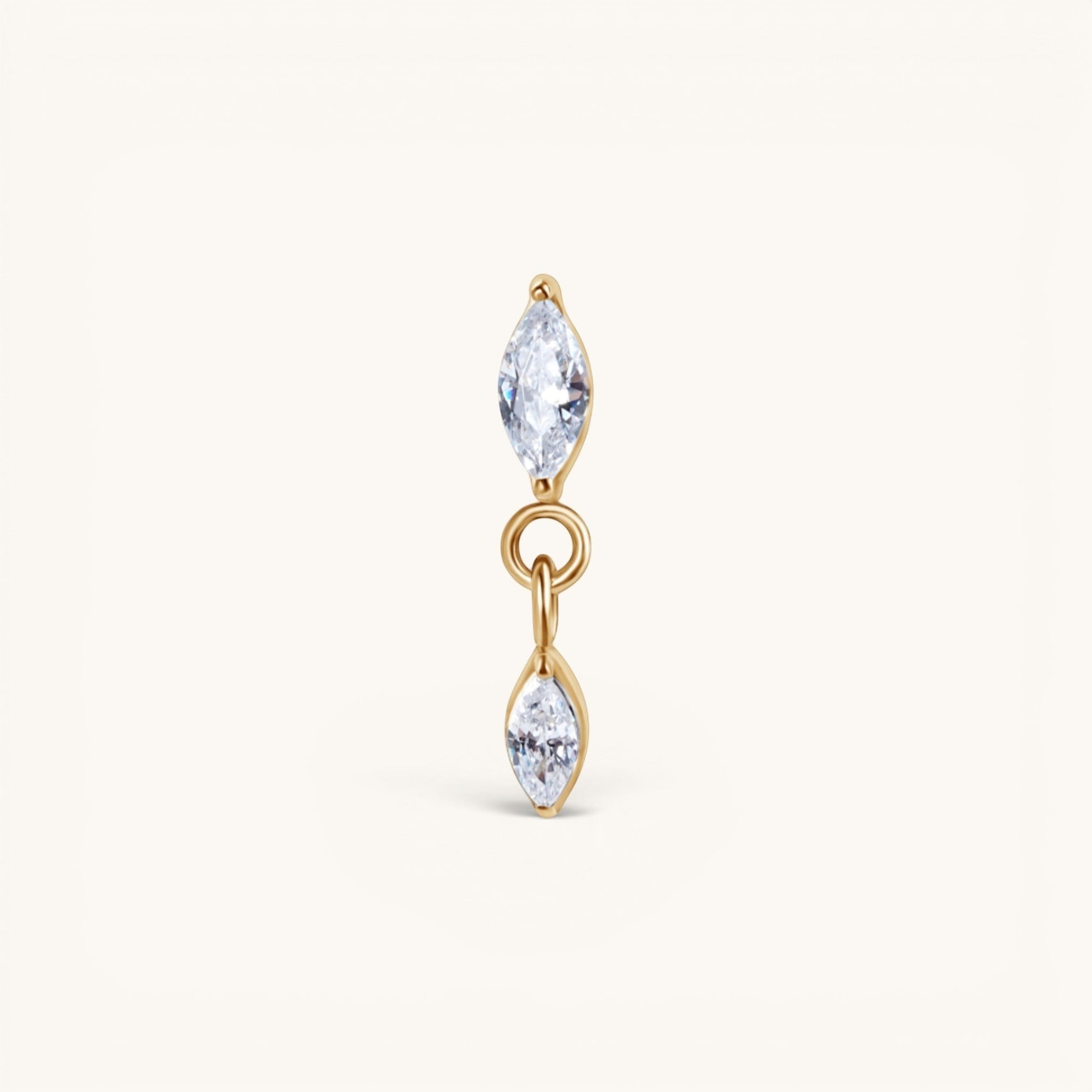 Nadare Co. Camille threadless earring front with two marquise-cut cubic zirconia stones in gold setting.
