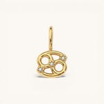 Nadare Co. gold-plated Cancer zodiac charm with cubic zirconia accents on a stainless steel base.