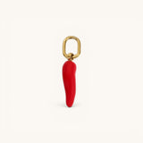 Nadare Co. chili pepper charm in vibrant red enamel with a polished gold-tone metal loop for necklaces or bracelets.