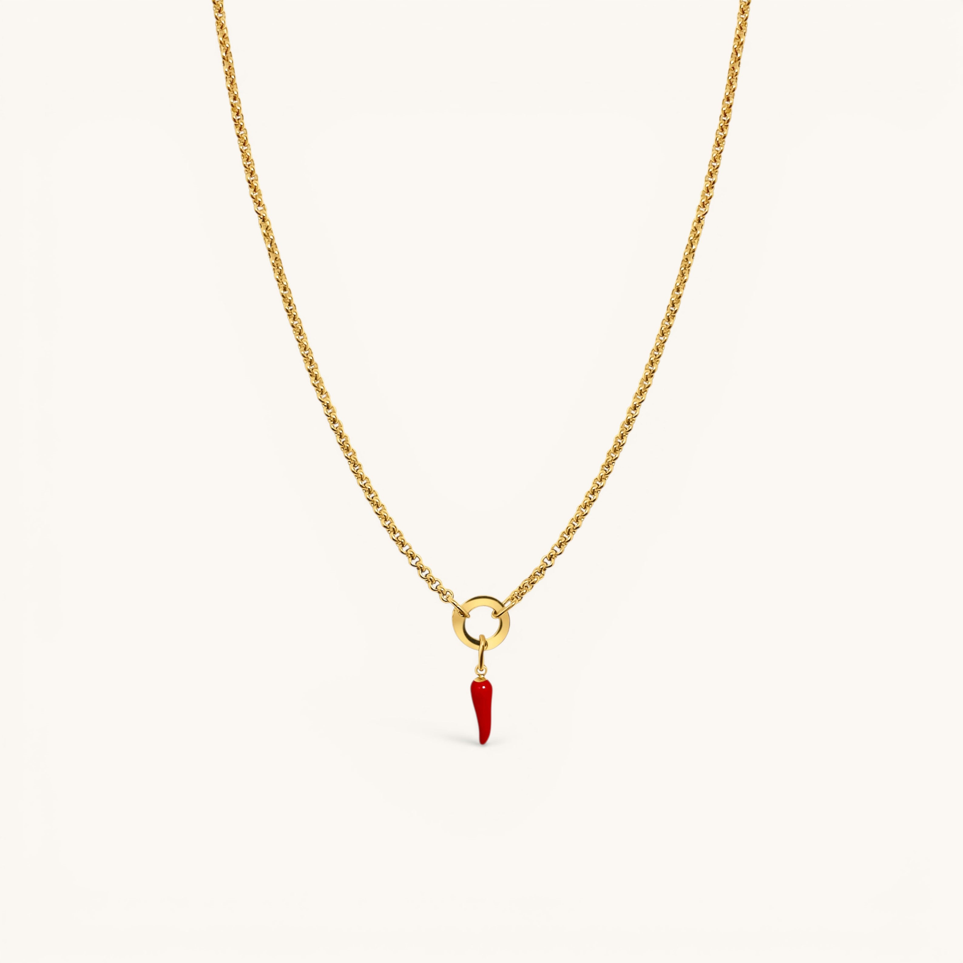 Nadare Co. gold chain necklace featuring a small red enamel chili pepper charm on a circular pendant loop.