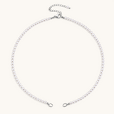 Nadare Co. Classic Pearl Chain featuring round white imitation pearls with a silver-tone clasp and adjustable chain.