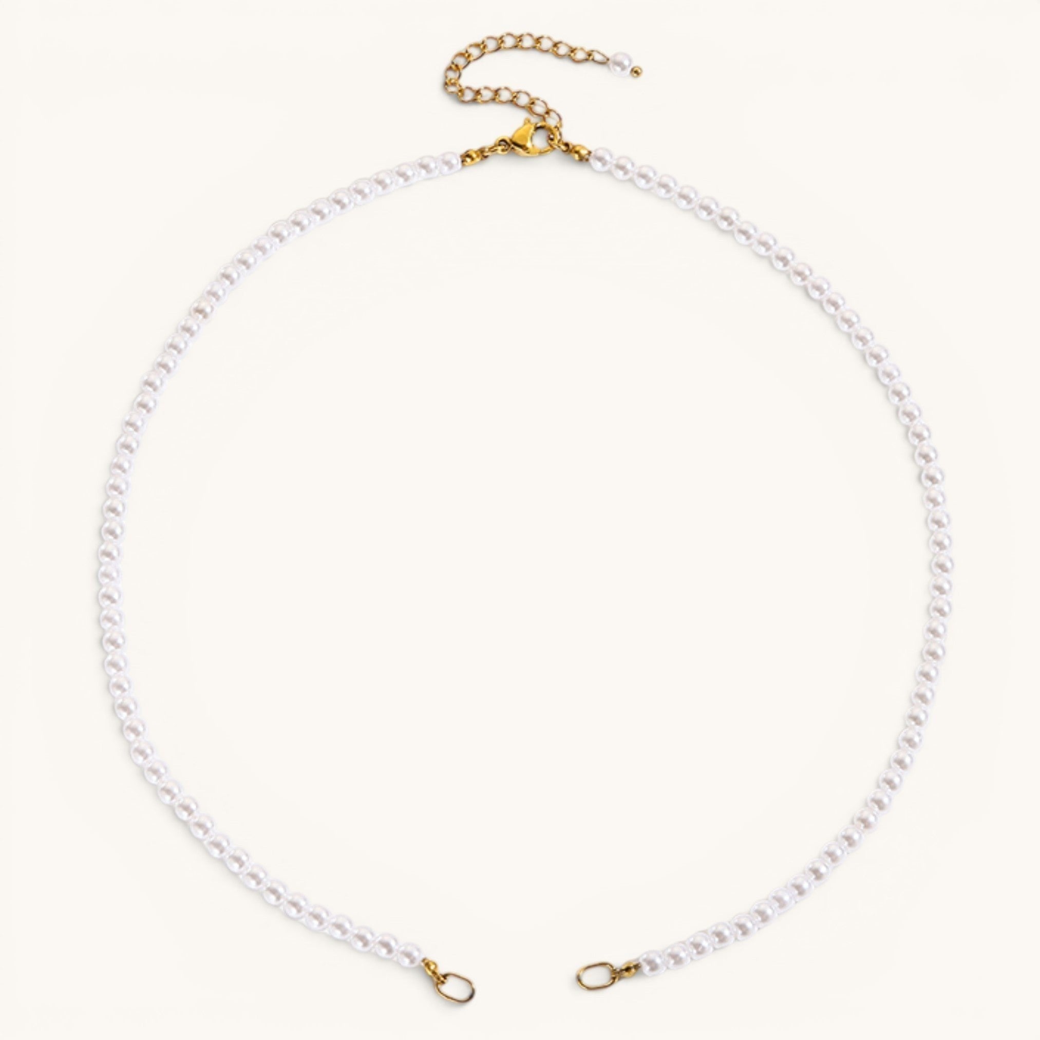 Nadare Co. Classic Pearl Chain featuring round imitation pearls with gold-tone clasp and adjustable extender chain.