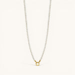 Nadare Co. Classic Pearl Chain featuring round white imitation pearls and a gold-tone circular clasp.