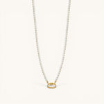 Nadare Co. Classic Pearl Chain necklace with round white imitation pearls and a gold-tone oval clasp charm holder.