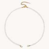 Nadare Co. Classic Pearl Chain featuring round white imitation pearls with a gold-tone clasp and extender chain.