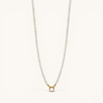 Nadare Co. Classic Pearl Chain featuring round white imitation pearls with a gold-tone clasp and crystal accents.