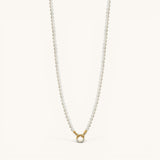 Nadare Co. Classic Pearl Chain featuring round white imitation pearls with a gold-tone clasp and crystal accents.