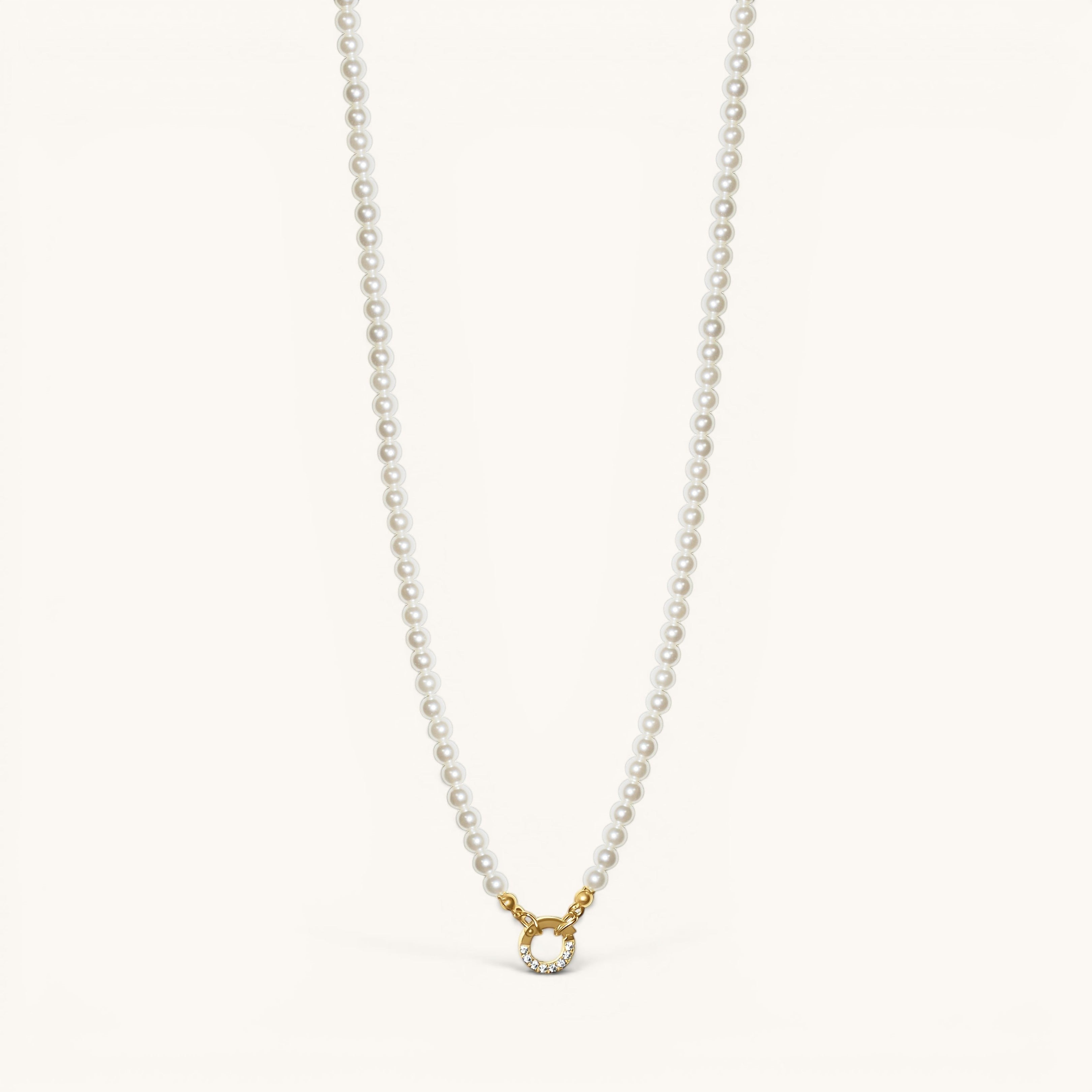 Nadare Co. Classic Pearl Chain featuring round white imitation pearls with a gold-tone clasp and crystal accents.