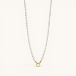 Nadare Co. Classic Pearl Chain featuring round white imitation pearls with a gold-tone clasp for charms.