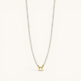 Nadare Co. Classic Pearl Chain featuring round white imitation pearls with a gold-tone clasp for charms.