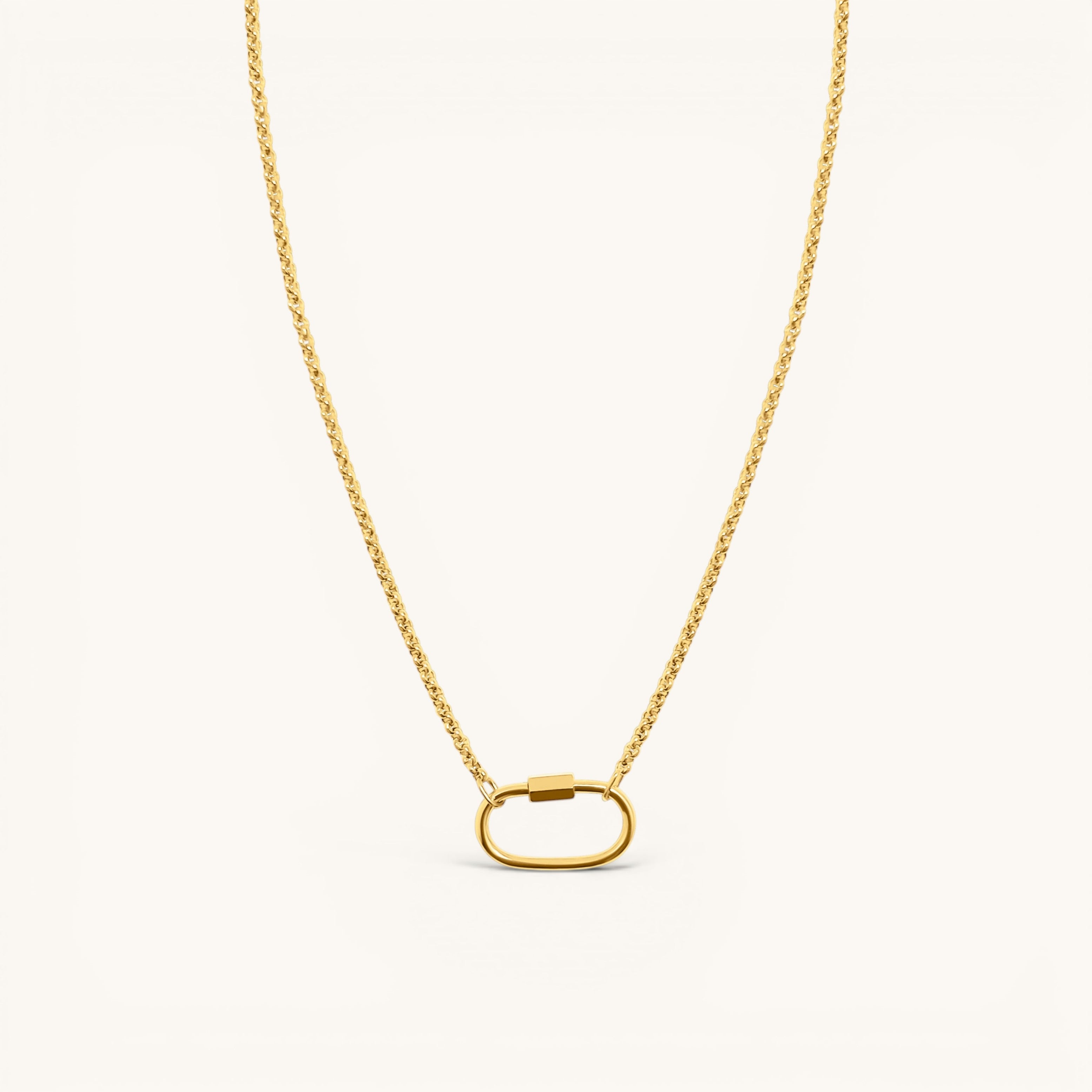 Nadare Co. Classic Switch Chain necklace in 14k gold plated stainless steel with a dainty oval carabiner pendant.