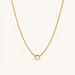 Nadare Co. gold-plated stainless steel Classic Switch Chain necklace with a crystal-accented circular pendant.