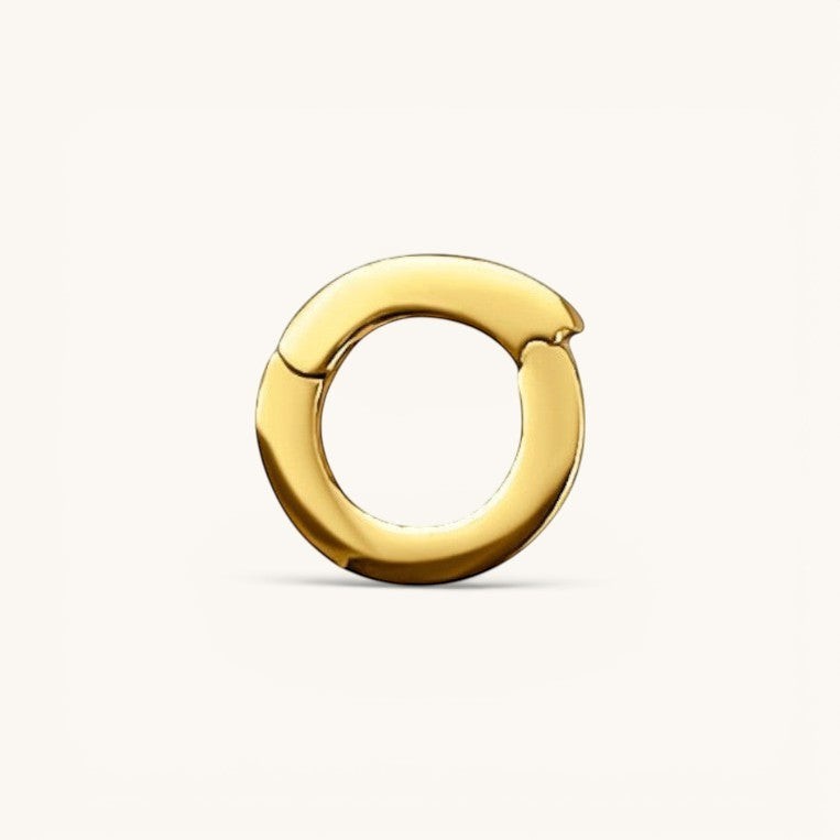 Nadare Co. gold circular switch clasp for charm necklaces with a polished, minimalist design.