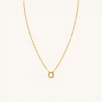 Nadare Co. gold circular switch clasp on a matching delicate link chain for charm necklace styling.