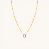 Nadare Co. gold circular switch clasp on a matching delicate link chain for charm necklace styling.