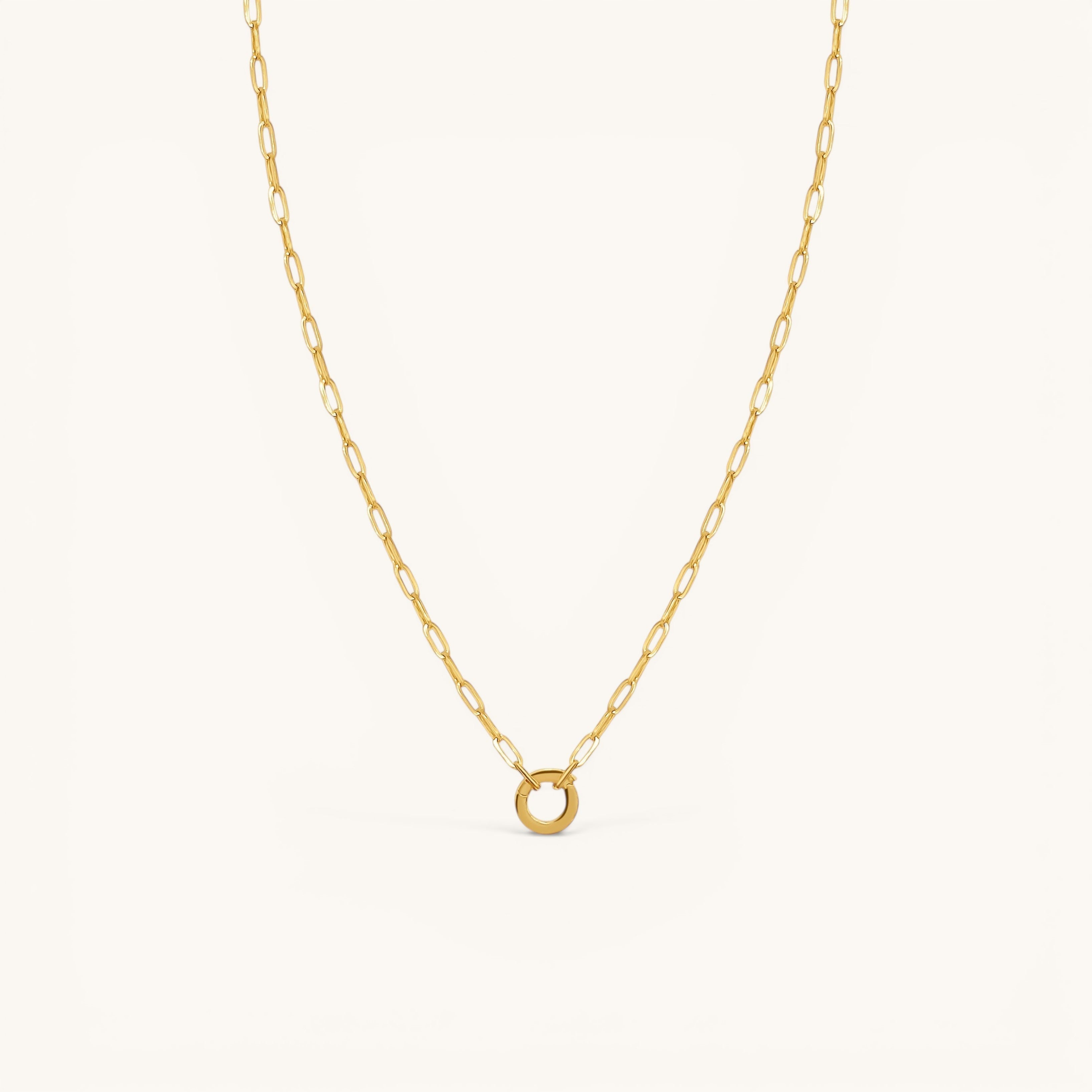 Nadare Co. gold circular switch clasp on a matching delicate link chain for charm necklace styling.