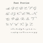 Elegant cursive font preview for custom Nadare Co. name necklaces, featuring uppercase and lowercase letters.