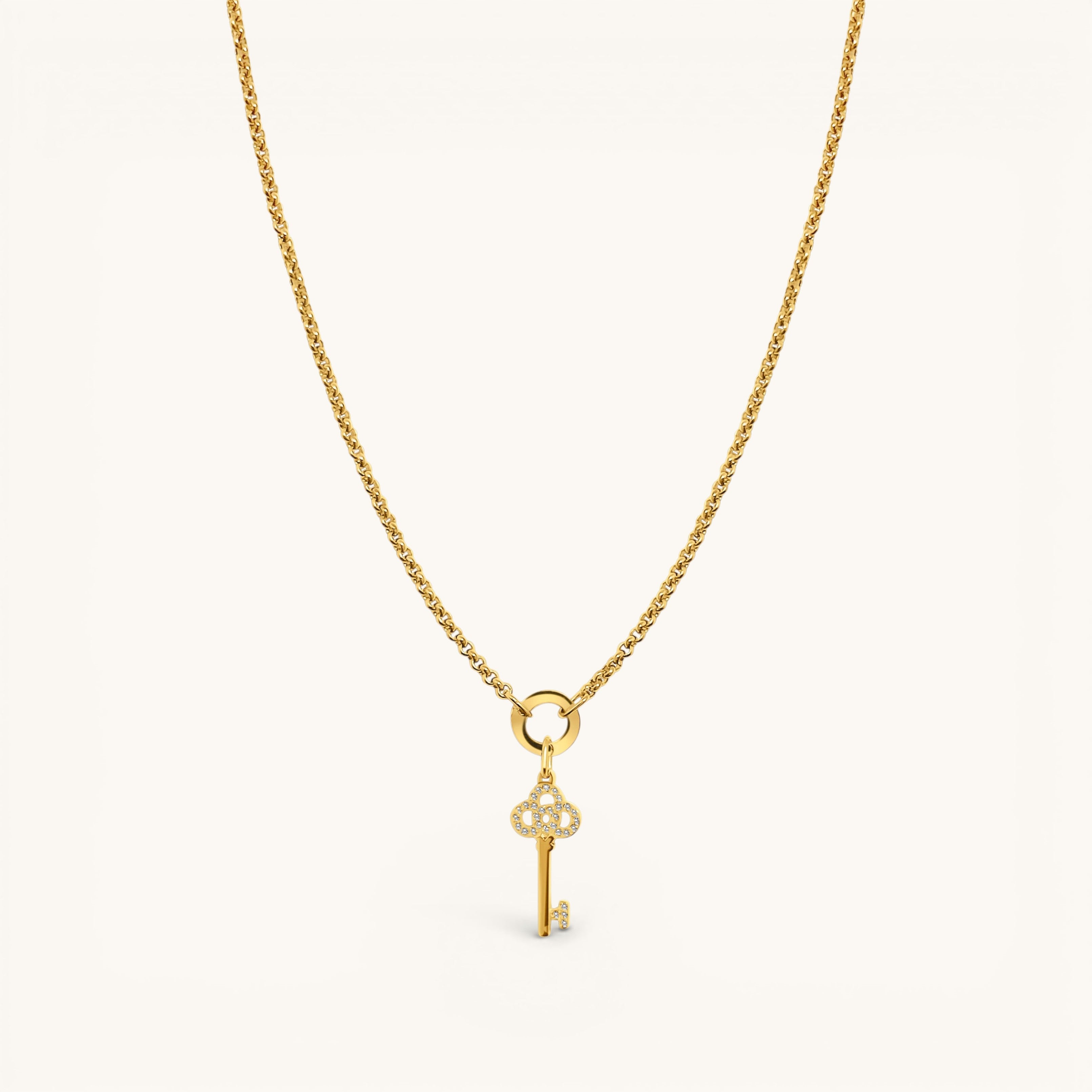 Nadare Co. gold necklace featuring a delicate key charm pendant encrusted with sparkling diamonds.