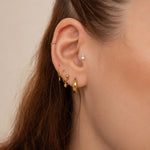 Nadare Co. Elle Threadless Front earring featuring two stacked cubic zirconia stones worn in a flat piercing