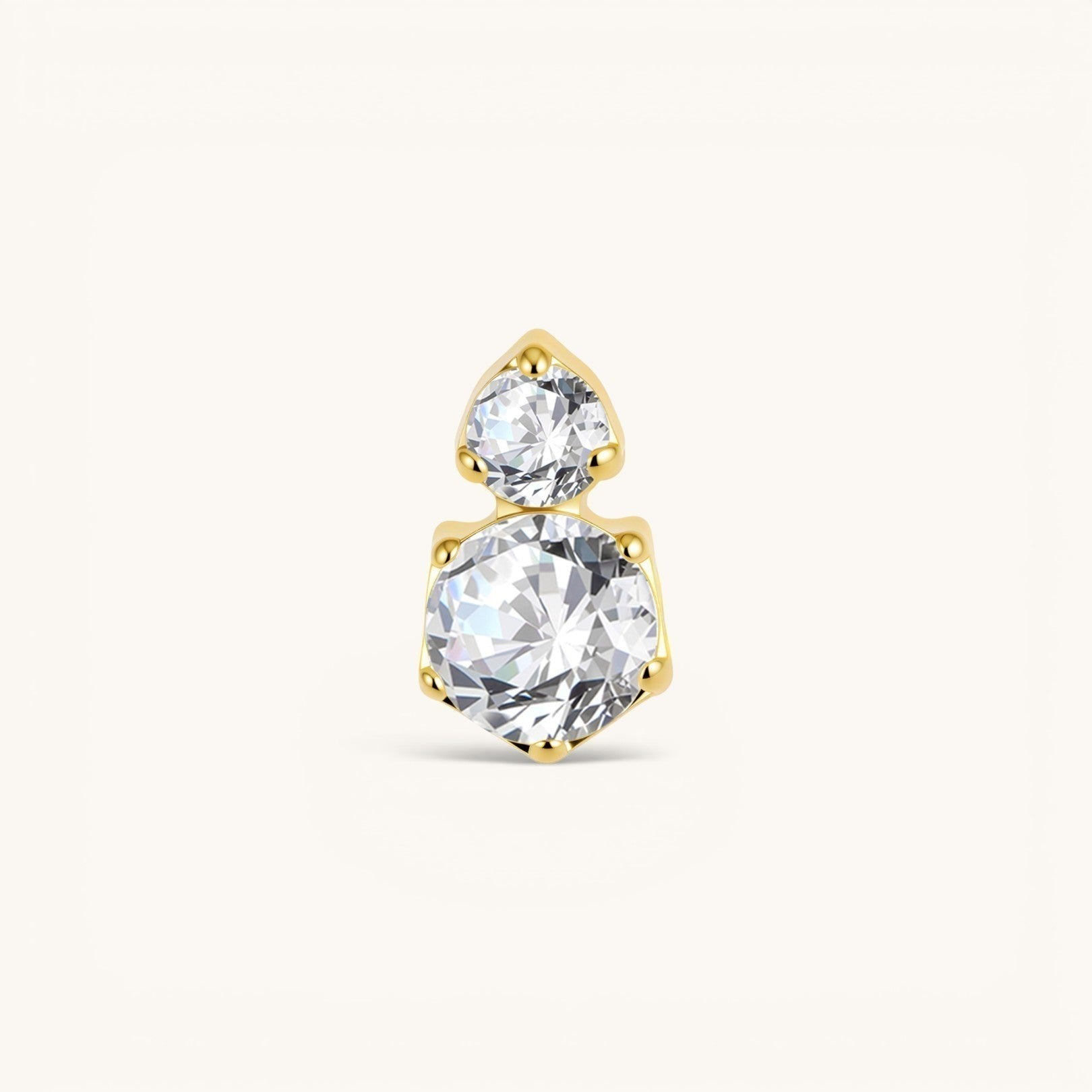 Nadare Co. Elle Threadless Front featuring two round-cut cubic zirconia stones in a gold stacked piercing design.