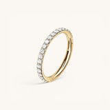 Nadare Co. Elodie Clicker Ring in gold-plated titanium with pavé-set cubic zirconia stones for piercings.