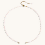 Nadare Co. freshwater pearl chain necklace with organic white pearls and gold-tone metal clasp and extender chain.