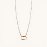 Nadare Co. freshwater pearl necklace featuring a gold carabiner clasp from the Switch Charm Collection