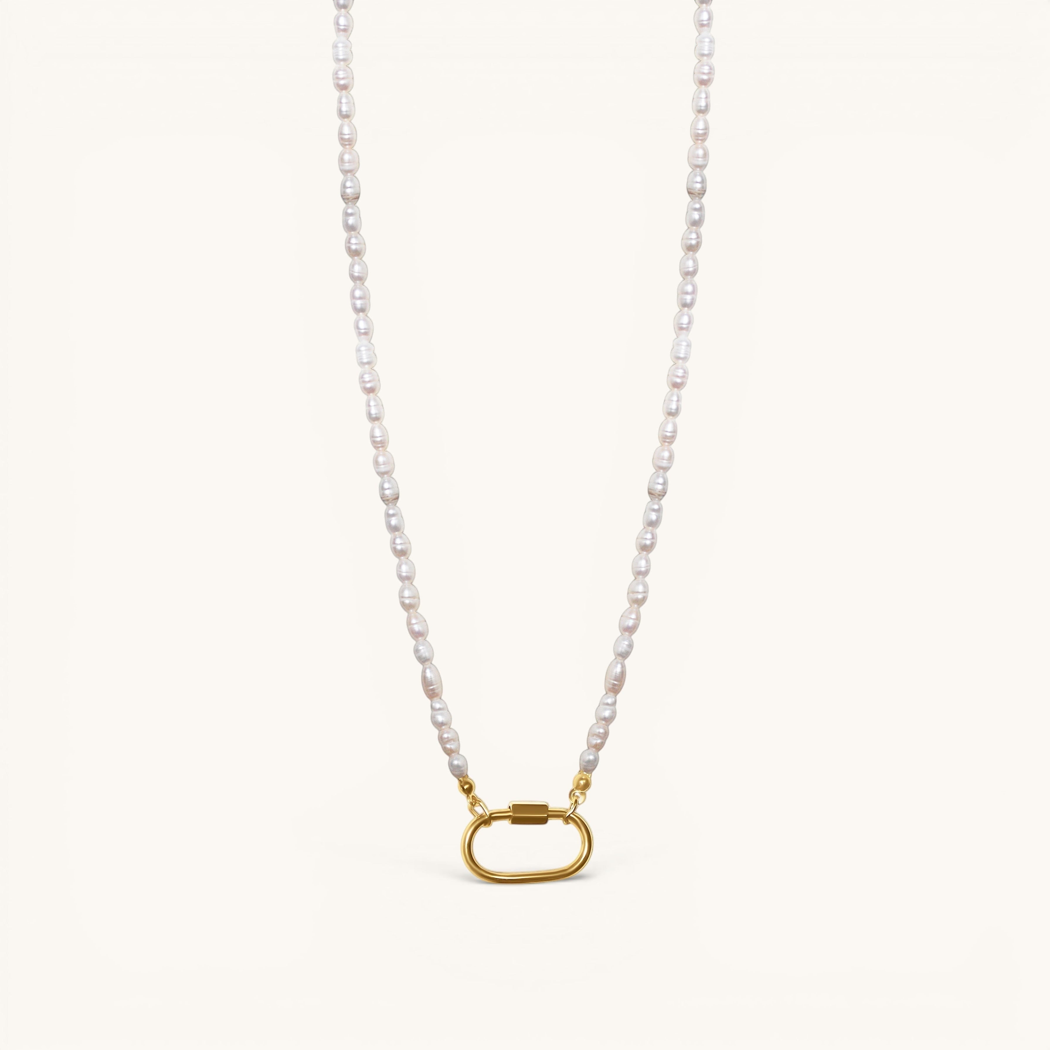 Nadare Co. freshwater pearl necklace featuring a gold carabiner clasp from the Switch Charm Collection