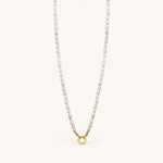 Nadare Co. freshwater pearl chain necklace with unique organic pearls and a gold-toned circular clasp.