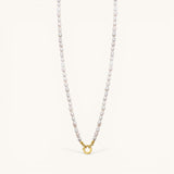 Nadare Co. freshwater pearl chain necklace with unique organic pearls and a gold-toned circular clasp.