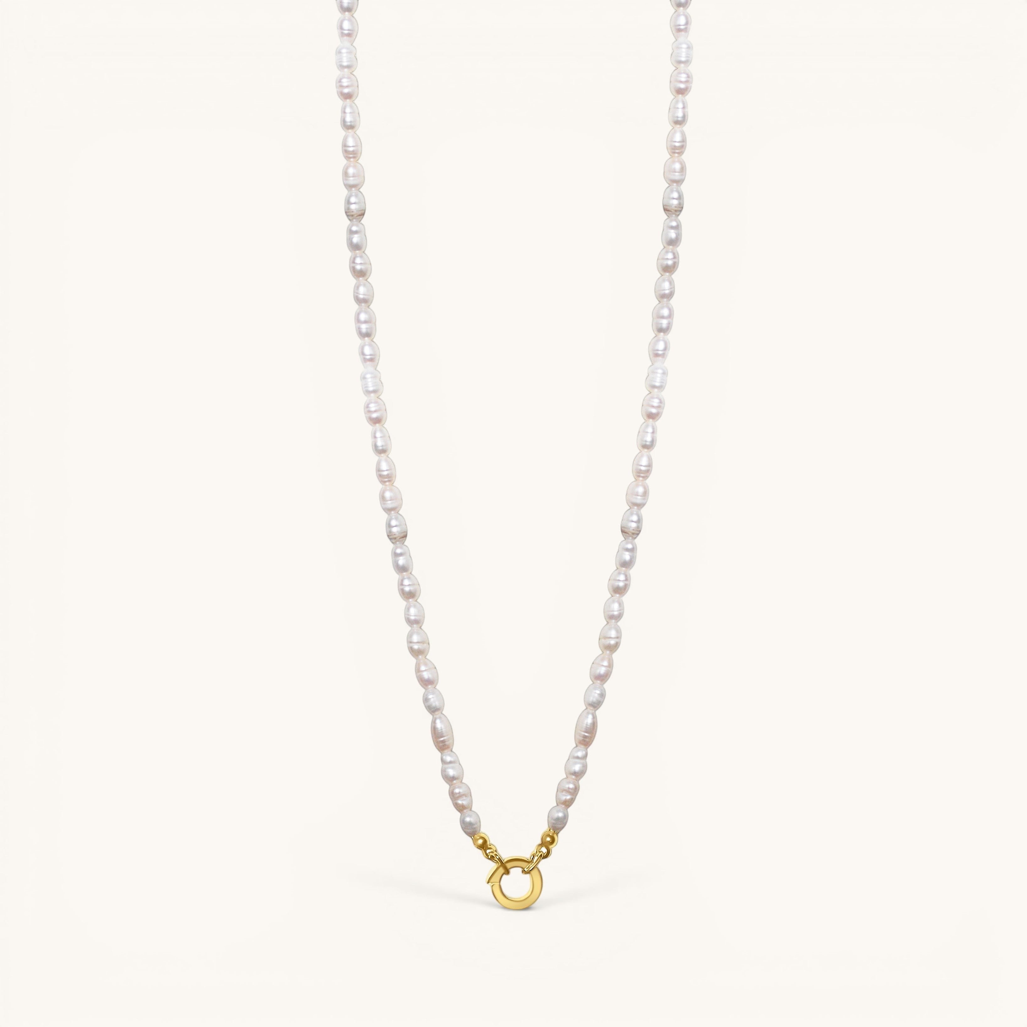 Nadare Co. freshwater pearl chain necklace with unique organic pearls and a gold-toned circular clasp.