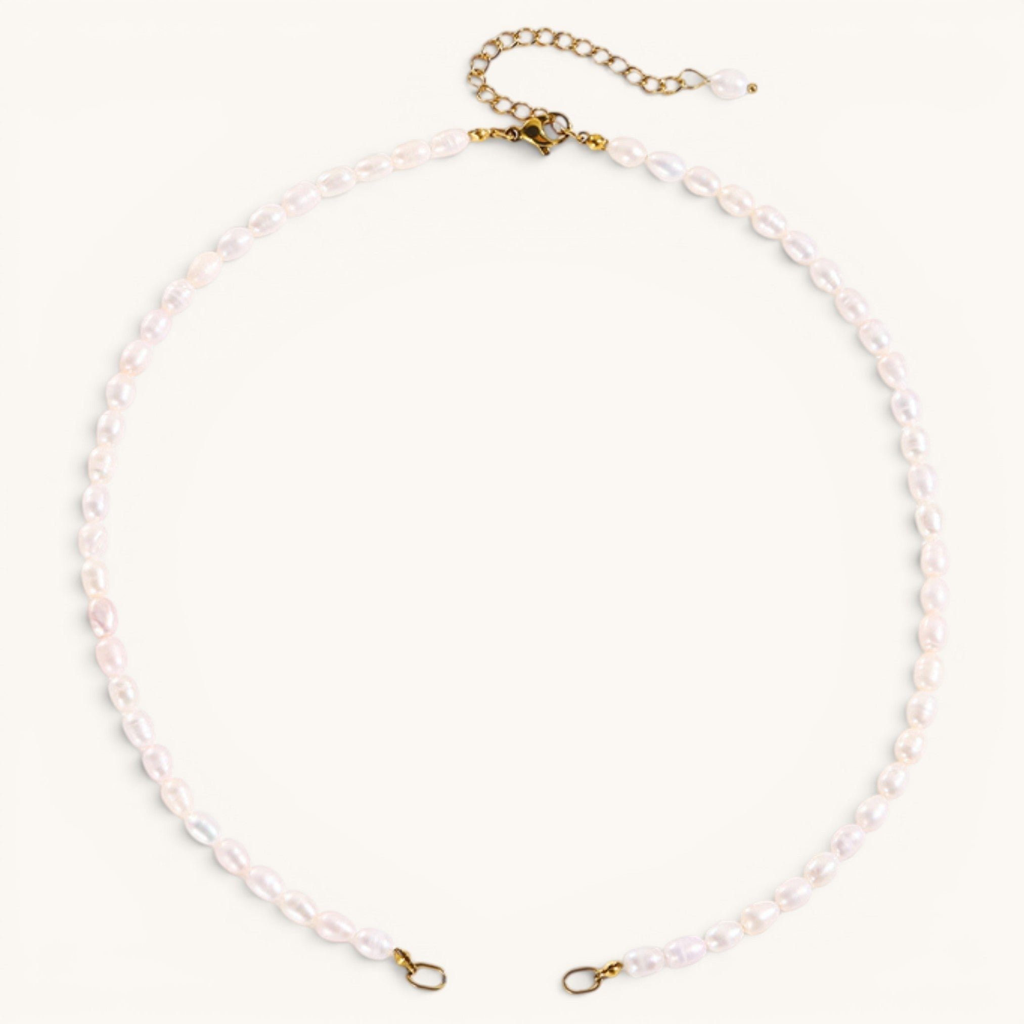 Nadare Co. freshwater pearl chain necklace with gold-tone clasp and adjustable extender on a white background.