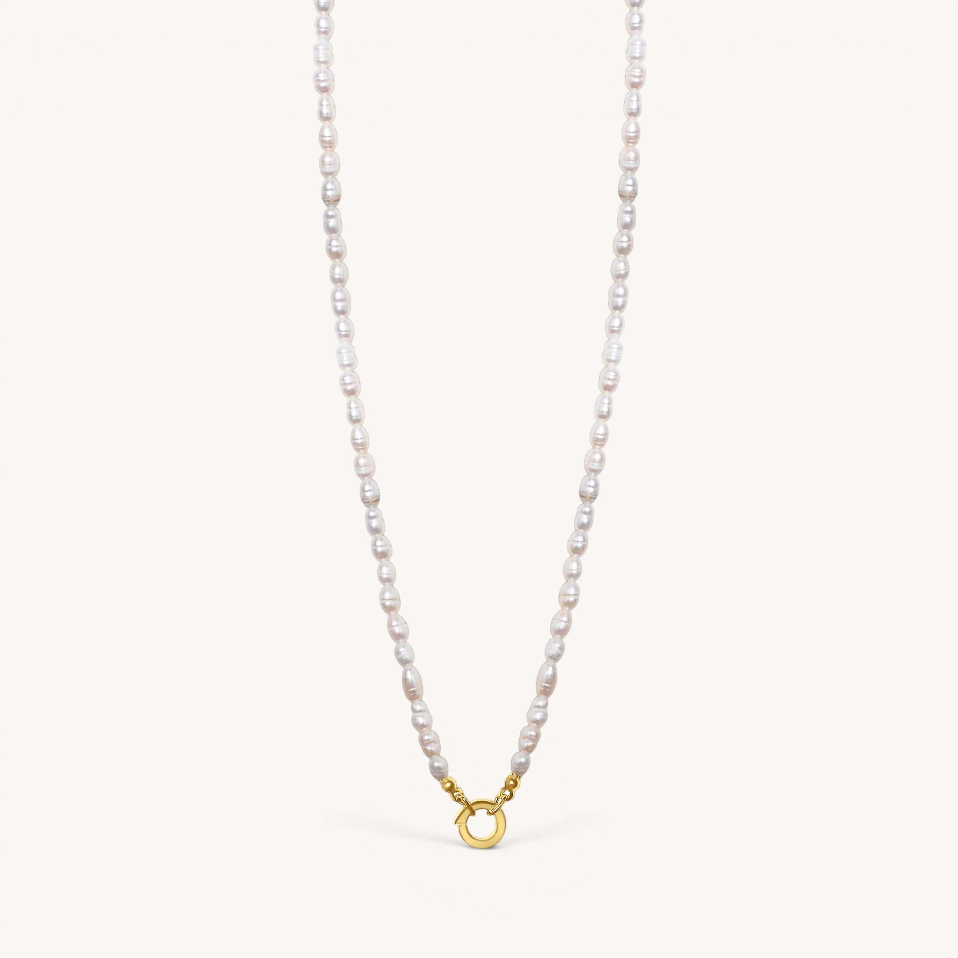 Nadare Co. freshwater pearl chain necklace with a gold-toned circular clasp on a light background.