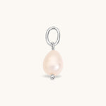 Nadare Co. Pearl Charm featuring an organic freshwater pearl on a silver-toned metal ring for necklace layering.