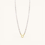 Nadare Co. freshwater pearl necklace featuring a gold heart-shaped clasp from the Switch Charm Collection.