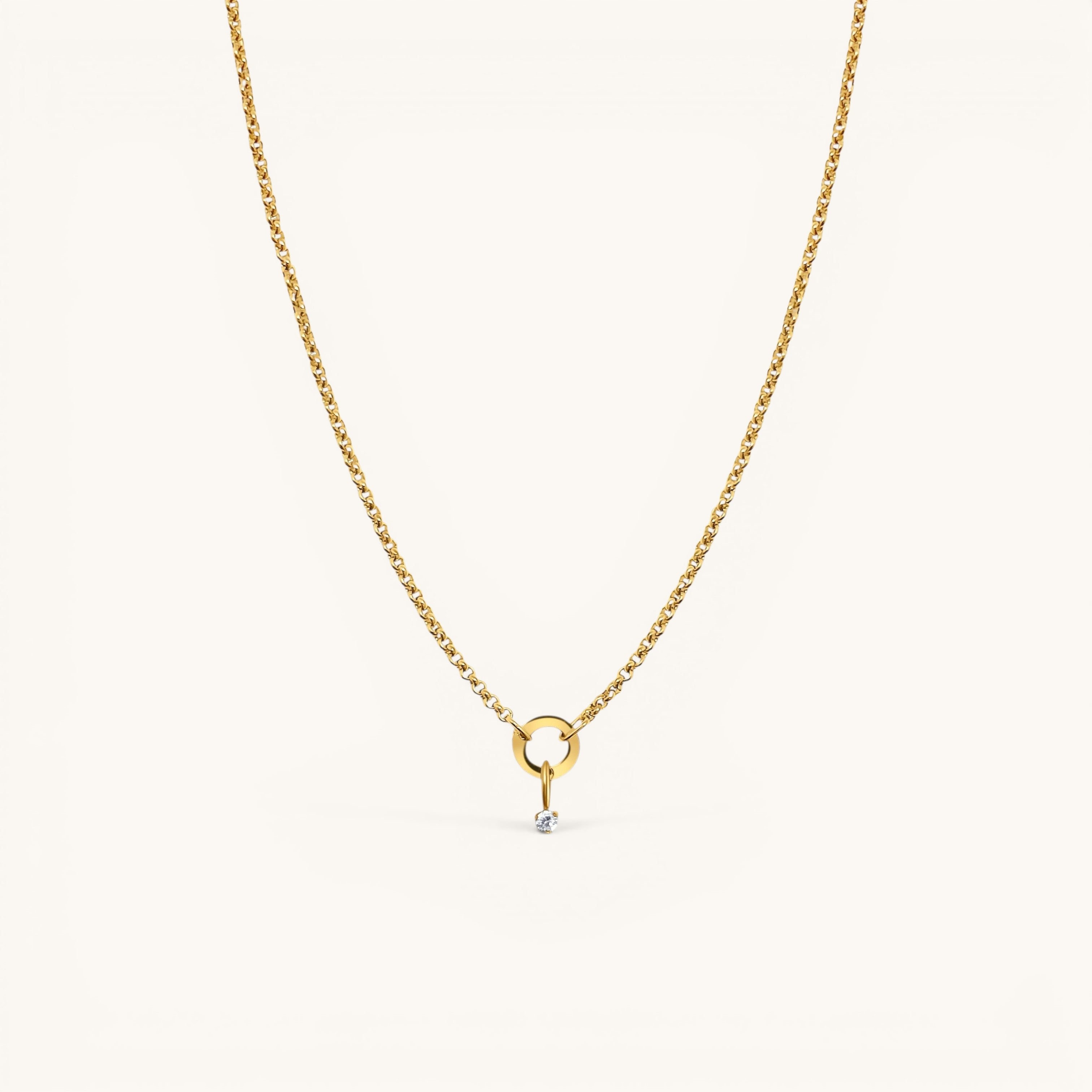 Nadare Co. gold chain necklace featuring a delicate mini birthstone charm on a small circular pendant link.