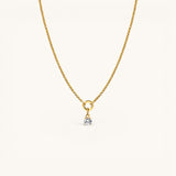 Nadare Co. gold-plated stainless steel round birthstone charm necklace with a sparkling cubic zirconia stone.