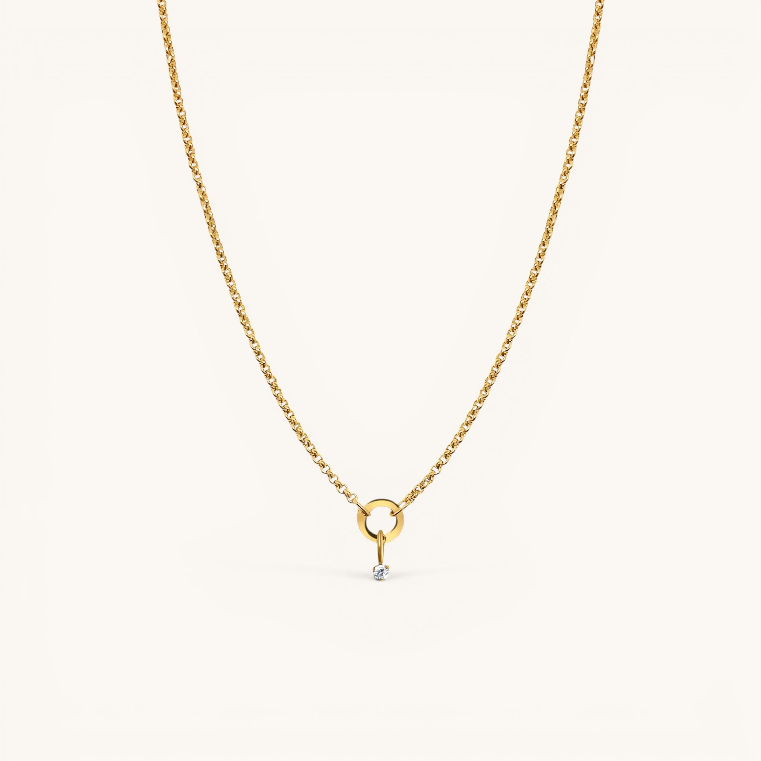 Nadare Co. gold-plated stainless steel necklace featuring a delicate mini cubic zirconia birthstone charm.