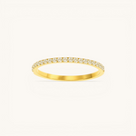 Nadare Co. Prism Birthstone Ring featuring a delicate gold band with a row of sparkling clear stones