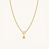 Nadare Co. gold-plated stainless steel bubble initial charm pendant on a delicate chain necklace
