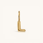 Nadare Co. gold-plated stainless steel bubble initial charm in the shape of the letter L with a polished finish.