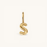 Nadare Co. gold-plated stainless steel bubble initial charm in the shape of the letter S.